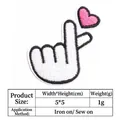 Detailed view of the heart gesture embroidery patch including size and weight specs. - Finger Heart Style (T732)