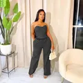 Trendiges ärmelloses Set aus gewaschenem schwarzem Denim: Korsett-Top und weite Hose - Schwarz