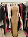 Exquisite detail of sparkling gold rhinestones on a high-end nude mesh evening gown - S / Dresses / Gold