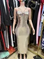 Dettaglio dell'abito lungo sexy con paillettes champagne e spalline sottili doppie - Taglia S / Vestiti / Argento