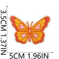 Macro view of a colorful butterfly embroidery patch showing 5cm width and 3.5cm height - Colorful Heart Butterfly (X30YJ-075-16)