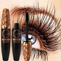 Macro detail of mascara brush and tubes for long-lasting curling and lengthening. - Brown (B6994)