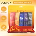 Vista dettagliata del set di 5 creme per le mani BOSUYA in un astuccio giallo portatile - Kit Crema Mani Fragranza (B2242)