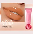 Glossy hydrating jelly lip gloss in shade 02 Bunny Fizz for plump and radiant lips. - 02# Bunny Fizz