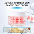 FORMBO Active Ingredient Elastic Face Cream with pink protein pearl beads in a clear jar - Elasticity and Firming / Pink