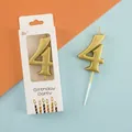 Golden number 4 birthday candle cake topper presented in premium white gift box - Number 4 / Gold