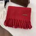 Solid red wool scarf with decorative tassels for winter warmth and soft texture - Warp Knitted Tassel Style / Christmas Red