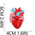 Close-up of 6x4cm cartoon heart embroidered patch with dimension markings and texture - Heart Style (C26XZ-09-32)