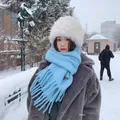 A cozy light blue solid color wool scarf with long tassels for warm winter style. - Warp Knitted Tassel Style / Iceland Sea Salt Blue