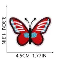 Vista dettagliata della toppa ricamata a farfalla rossa e blu con misure 4,5cm e 3,3cm - Farfalla Colorata Rosso Brillante (C19HD-068-23) / 1 Pezzo