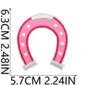 Macro detail of pink horseshoe embroidered patch with clear dimensions 6.3cm by 5.7cm - Horseshoe Style (X11NZ-11-39) / 6.3x5.7cm