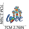 Detailed view of Autism awareness love heart embroidered patch with size markings - Puzzle Love Handprint Style (X23ZB-13-11)