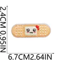Detailed size view of cute cartoon band-aid embroidery patch measuring 6.7cm by 2.4cm - Cartoon Band-aid Style (C26XZ-088-17)