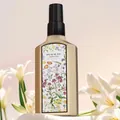 Spray parfumé Peach Jo+ dans un flacon doré aux senteurs de gardénia et de jasmin - Noix de coco