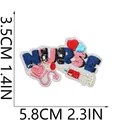 Detailed view of embroidered nurse patch with dimensions 5.8x3.5cm and 2.3x1.4in. - Nurse Theme Style (C26XZ-066-09)