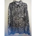 Classic men's long-sleeve lapel shirt featuring black and white leopard print pattern - S / Tops / Black Leopard