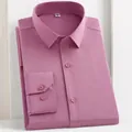 Professional dusky pink long-sleeve bamboo fiber dress shirt in a neat folded view - 38 / Tops / Pink