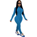 Full body view of a tight-fitting blue long-sleeved jumpsuit with a front zipper detail - S / Set / Dark Blue