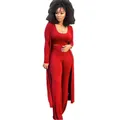 Detail of the red 3-piece ribbed knit set featuring a crop top, pants, and cardigan. - S / Set / Red
