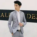 Elegante completo da uomo grigio chiaro slim fit con giacca e pantaloni formali - Taglia M / Top E Pantaloni / Grigio