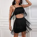 Elegante conjunto de dos piezas negro con top corto de flecos largos y minifalda - XS / Top Y Pantalón / Negro