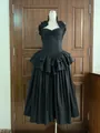 Vista detallada del vestido halter negro con varillas de corsé y falda plisada grande - S / Vestidos / Negro