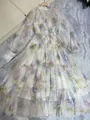 Close-up of floral print sheer dress with lantern sleeves and tiered ruffled skirt detail. - S / Dresses / Off-White Floral (Long Style)