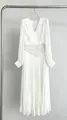 Close-up of elegant white V-neck pleated tulle maxi dress with beaded waist - S / Dresses / White