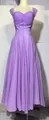 Elegant lavender purple pleated sweetheart neck dress with a flowing maxi skirt detail - Purple