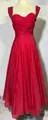 Detailed view of elegant red evening dress featuring a pleated bodice and sweetheart neckline - 3XL / Dresses / Red