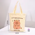 Bolso de lona crema con lindo estampado de capibara, mide 33x37cm para uso diario. - Estampado de carpincho / 33x37cm / Beige