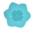 Detailed top view of a lotus-shaped silicone soap dish featuring drainage holes in blue - 12.5cm (No Packaging) / Sky Blue
