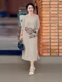 Robe mi-longue beige élégante, coupe ample avec broderies d'oiseaux et de fleurs - S / Robes / Khaki