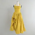 Elegant yellow halter neck midi dress with pleats and a full flared skirt. - S / Dress (KDR553597q) / Yellow