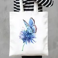 Detail of a white canvas tote bag with a beautiful blue butterfly and flower watercolor print. - Blue Butterfly and Flower Style (17)