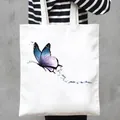 White canvas tote bag with artistic blue watercolor butterfly print. - Watercolor Butterfly Style (2)