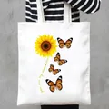 Stylish white canvas tote bag with vibrant sunflower and butterfly print design - Sunflower and Butterfly Style (7)