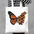 Fashionable white canvas tote bag with butterfly and orange flower print for daily use - Butterfly and Orange Floral Style (10)
