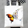 Stylish white canvas tote bag with vibrant colorful butterfly print for casual daily shopping - Gradient Butterfly Style (11)