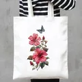 Stylish white canvas tote bag with vibrant pink hibiscus and butterfly watercolor print - Pink Hibiscus and Blue Butterfly Style (18)