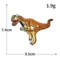 Detailed orange and yellow dinosaur embroidered patch measuring 9.5x7.4cm for clothing - R3592 T-Rex Style / 9.5x7.4cm