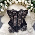 Elegant black lace corset top featuring delicate floral patterns and button details. - S / Tops / Black