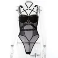 Detail van een zwarte mesh bodysuit met gekruiste halterbandjes en gouden gespen - S / Jumpsuits / Zwart