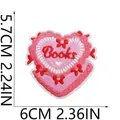 Close-up of heart-shaped 'Books' embroidered patch with size dimensions in cm and inches. - Literature Heart (C20GH-12-07)