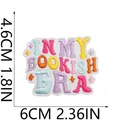 Detail view of 'IN MY BOOKISH ERA' colorful embroidered patch with size markers - Bookish Era (C20GH-08-08)