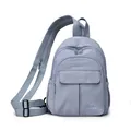 Light blue mini nylon waterproof backpack for women featuring a multi-pocket design - Blue