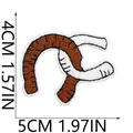 Dimensions of brown western cowboy embroidery patch showing 5cm width and 4cm height - Horseshoe Style (X11BM-058-17)