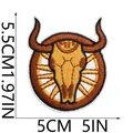 Detailed view of brown Western cowboy bull skull embroidered patch showing dimensions - Bull Skull with Wheel Style (X11BM-092-29)