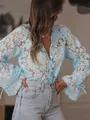 Detailed view of light blue floral lace shirt featuring delicate hollow-out patterns. - Sky Blue