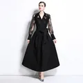 Elegant black long dress with embroidered mesh sleeves, Polo collar, and textured skirt - M / Dresses / Black